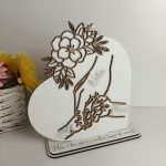 Suporte coração com mãos